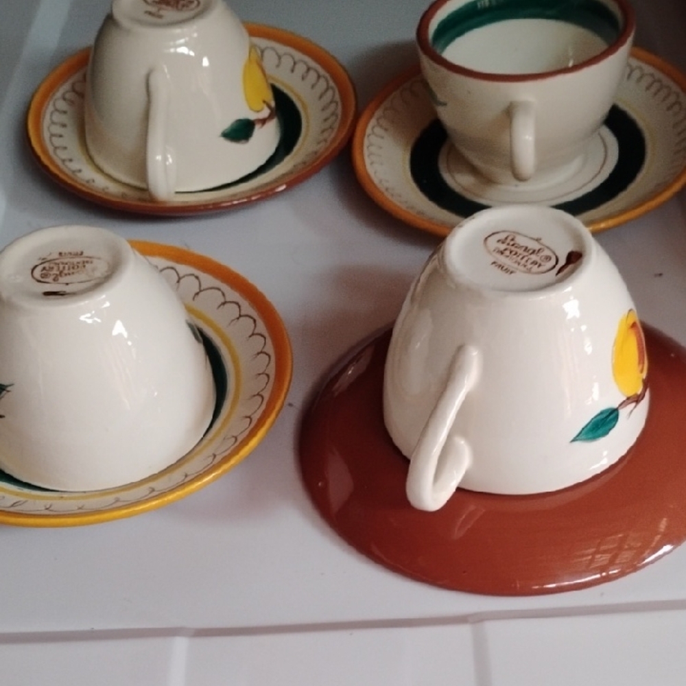 Elegant Ceramic Cup and Saucer Set with Fruit Motif